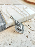Sacred Heart Necklace in 925 sterling silver with Mexican design and Frida Kahlo-inspired heart pendant on a Figaro chain.