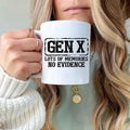 Funny Gen X Coffee Mug with black text that reads GEN X Lots of memories no evidence, held by a woman with blonde hair.