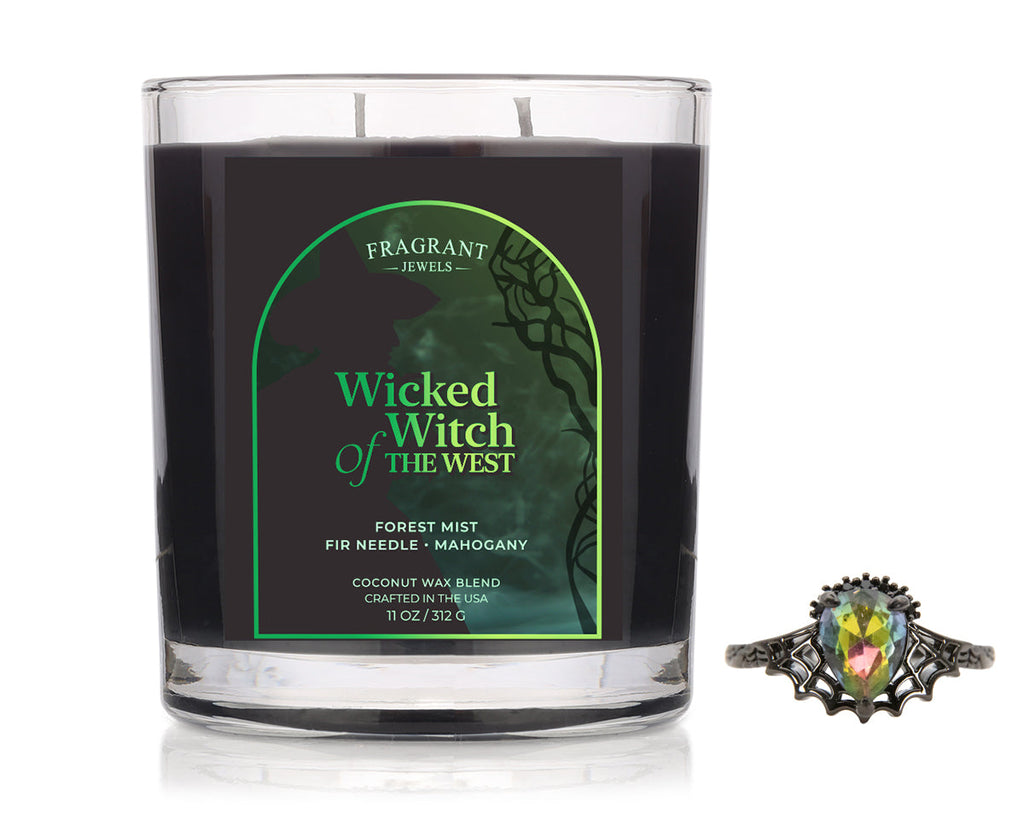 Wicked Witch of the West Jewel Candle with black wax, forest mist scent, fir needle and mahogany notes, and a spiderweb ring.