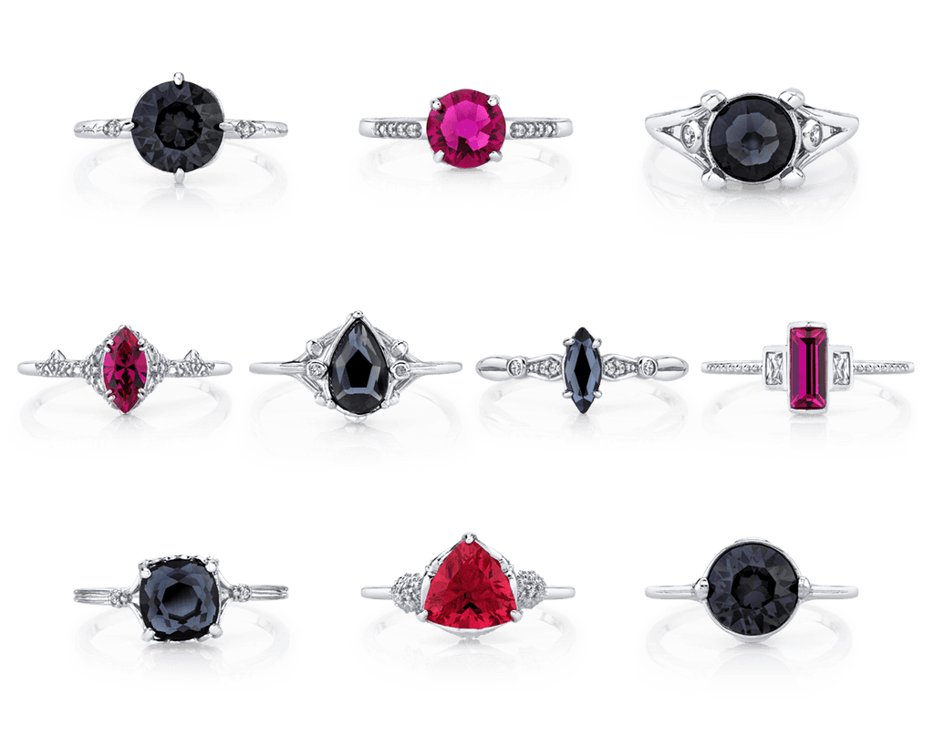 Black Dahlia Satin Collection Jewel Candle with black satin finish and embedded jewelry rings and gemstones.