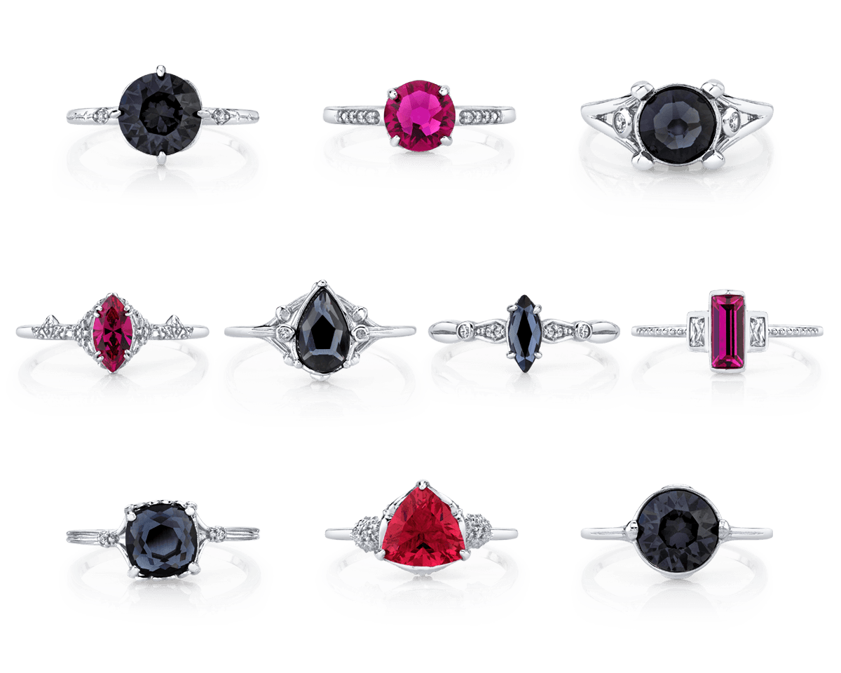 Black Dahlia Satin Collection Jewel Candle with black satin finish and embedded jewelry rings and gemstones.