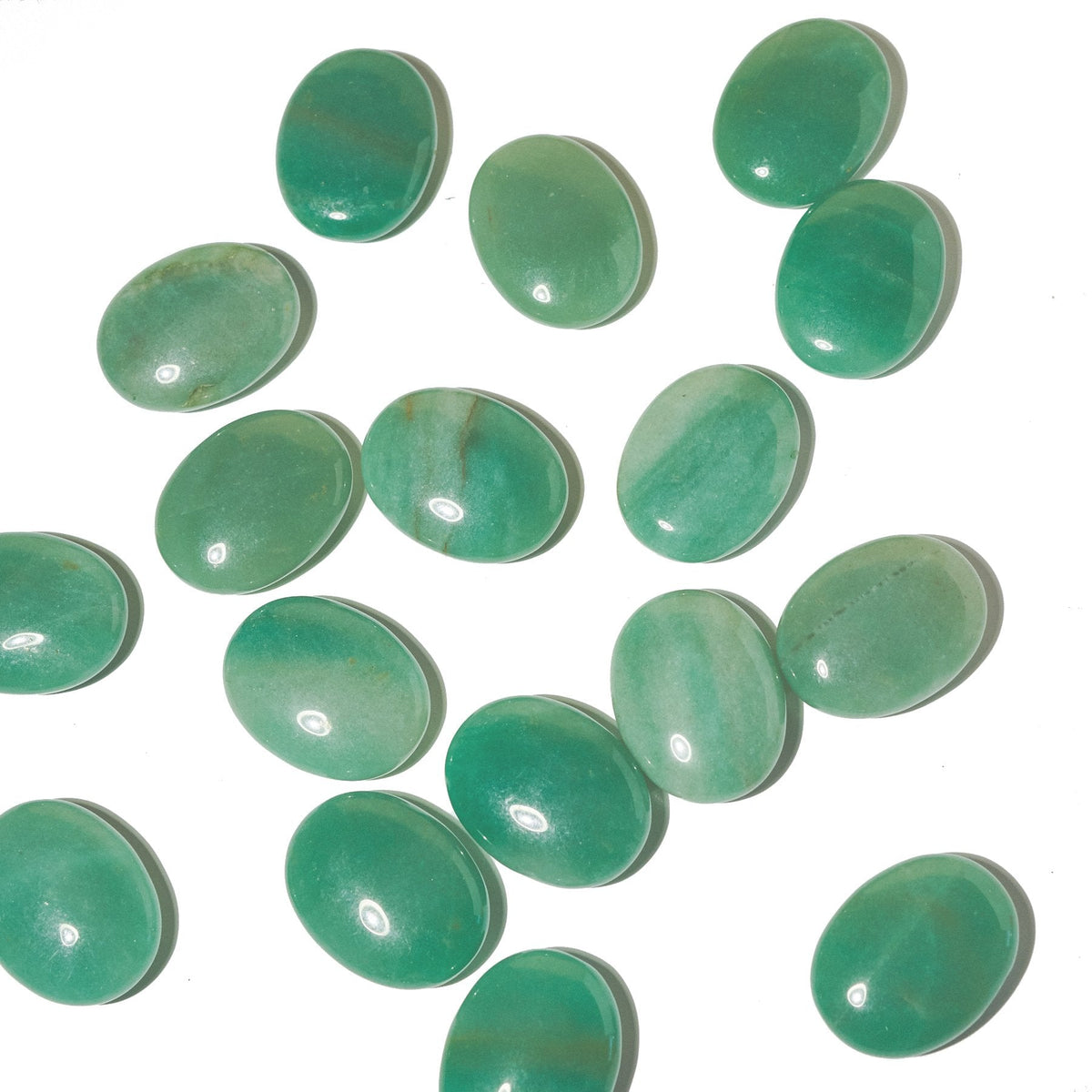 Green Aventurine Palm Stone with smooth, polished surface in vibrant green, used for meditation and healing practices.
