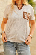 Ivory Brown Boot Stitch Rodeo Western printed stretch top with contrast pocket and V-neck, featuring allover boot stitch