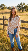 Blue B Rust Bandana vintage western snap-front shirt made of buttery-soft 100% rayon, worn by a smiling woman in a rural