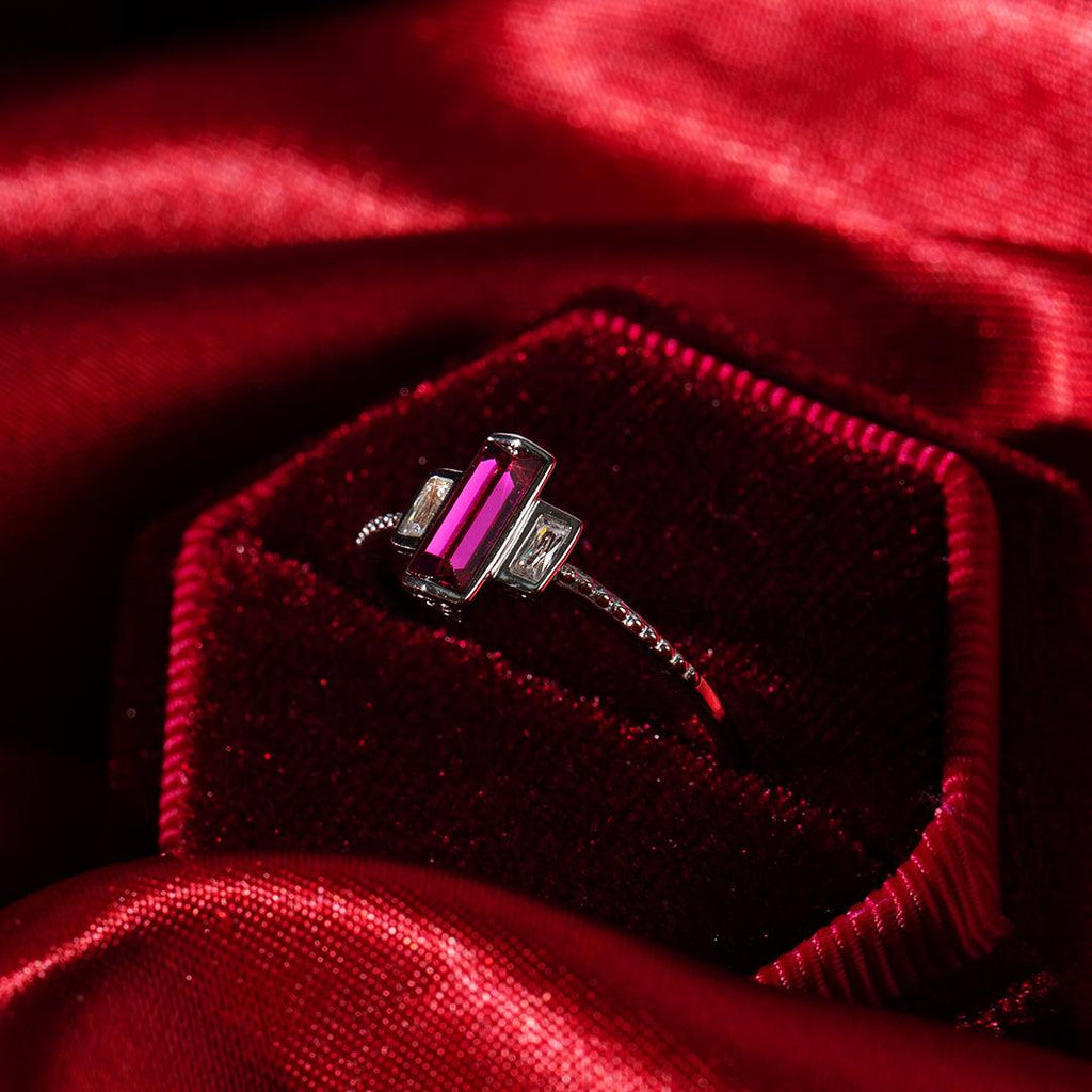 Black Dahlia Satin Collection Jewel Candle ring with a rectangular pink gemstone and two clear side stones, set in silver